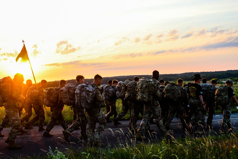 Spur Candidates Conduct a Ruck March During a Spur Ride