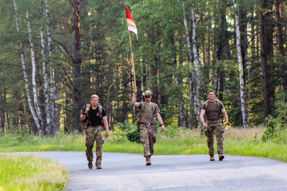 Spur Candidates Conduct a Ruck March During a Spur Ride