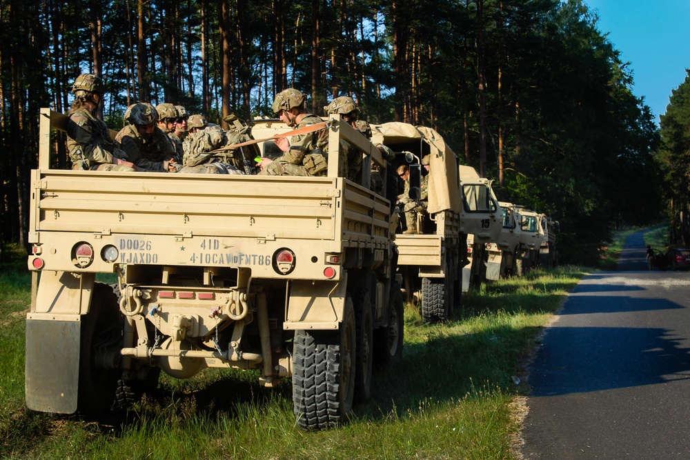 Spur Candidates Conduct a Ruck March During a Spur Ride