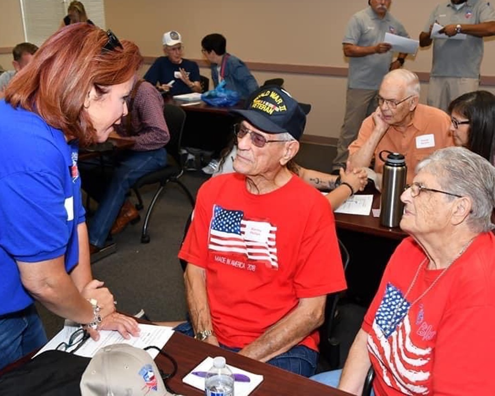 Jennifer Cross, 2021 Spirit of Hope awardee, meets WW II veteran before Honor Flight