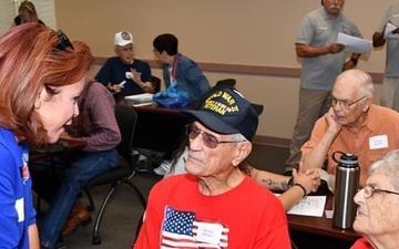 Jennifer Cross, 2021 Spirit of Hope awardee, meets WW II veteran before Honor Flight