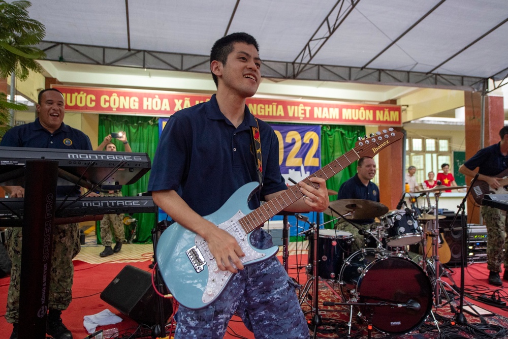 Members U.S. Pacific Fleet Band and JMSDF band Perform at High School in Vietnam During PP22