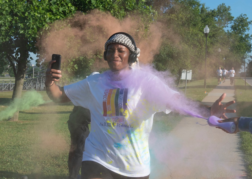 70th ISRW Airmen cap off Pride Month with a color run