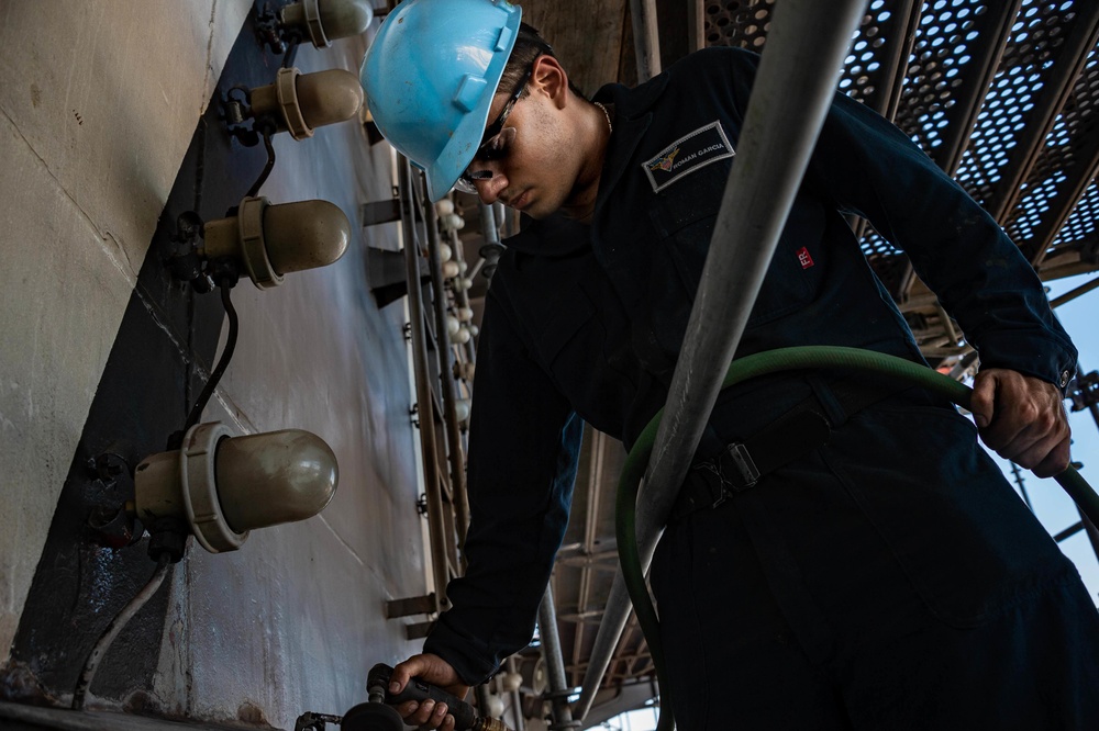 DVIDS - Images - Airman removes rust from the tower of USS Carl Vinson ...