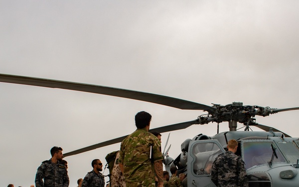 International Service Members Tour MH-60S Seahawk during RIMPAC 2022 SOCAL