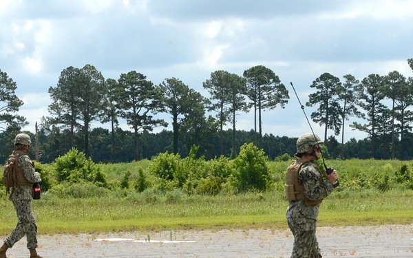 Damage Assessement Team Performs a Walkdown of the Runway
