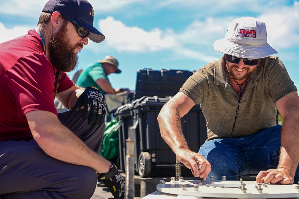 NSWC Corona Technicians prepare the USS Fitzgerald for PACDRAGON 2022