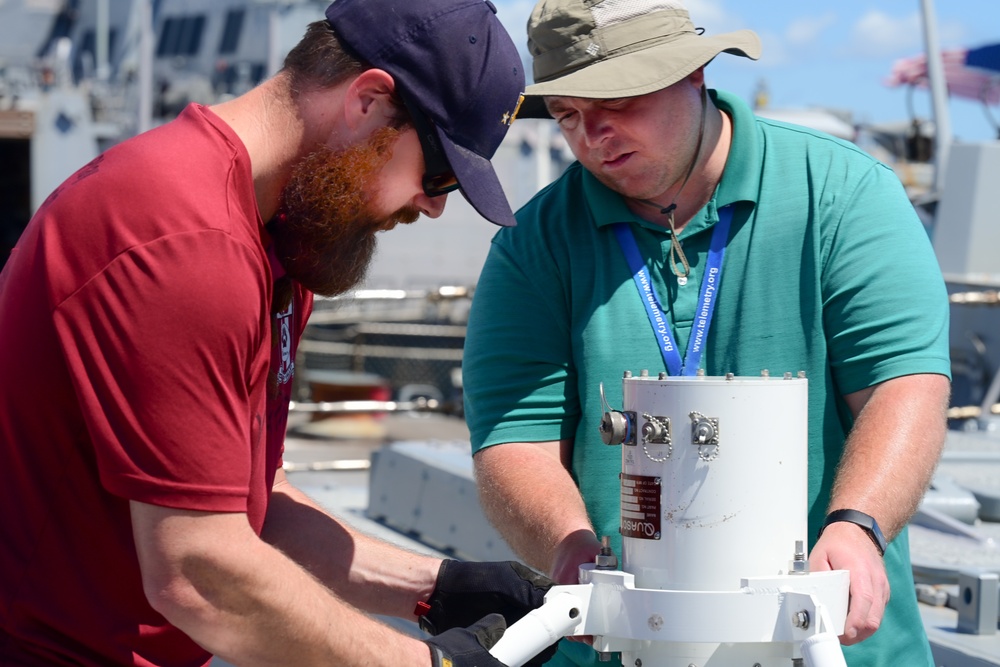 NSWC Corona Technicians prepare the USS Fitzgerald for PACDRAGON 2022