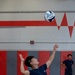 A Republic of Korea Navy Sailor serves in volley ball RIMPAC 2022