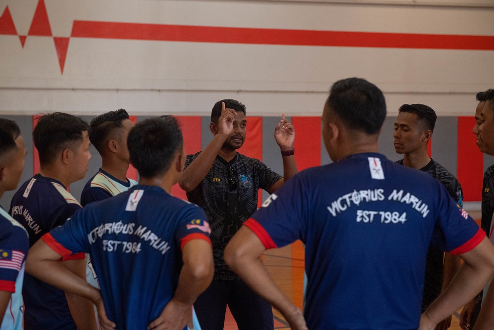 Royal Malaysian Navy Sailors play a game of volleyball during RIMPAC 2022