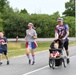 Photo Essay: Patriotic fun run gathers Fort Drum community members to starting line