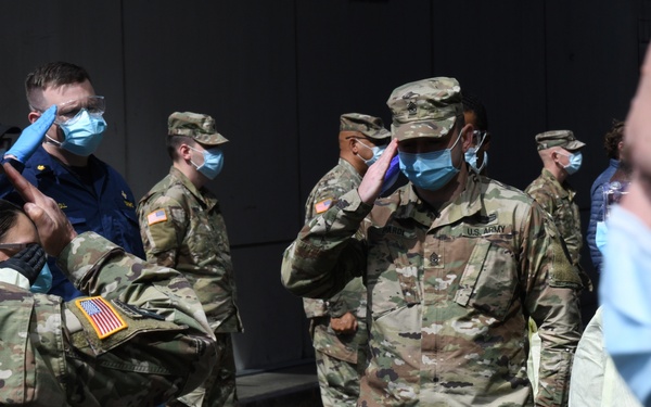 Military personnel honor deceased veteran in New York City