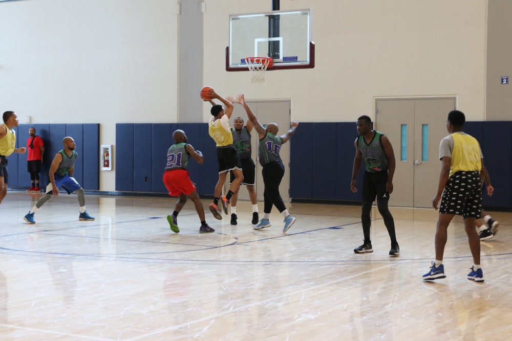 U.S. Navy Sailors from Abraham Lincoln, Essex participate in a basketball game during RIMPAC 2022