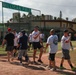 U.S. Navy Sailors from Abraham Lincoln, Gridley participate in a softball game during RIMPAC 2022