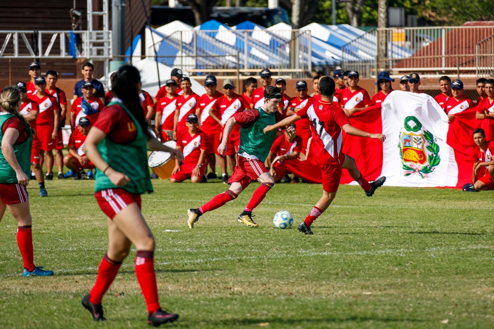 U.S. Navy Sailors from Abraham Lincoln participate in a soccer game against Peruvian sailors during RIMPAC 2022