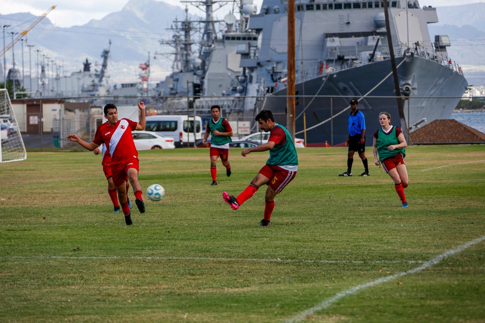 U.S. Navy Sailors from Abraham Lincoln participate in a soccer game against Peruvian sailors during RIMPAC 2022