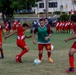 U.S. Navy Sailors from Abraham Lincoln participate in a soccer game against Peruvian sailors during RIMPAC 2022