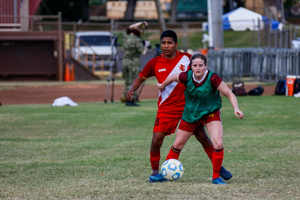 U.S. Navy Sailors from Abraham Lincoln participate in a soccer game against Peruvian sailors during RIMPAC 2022