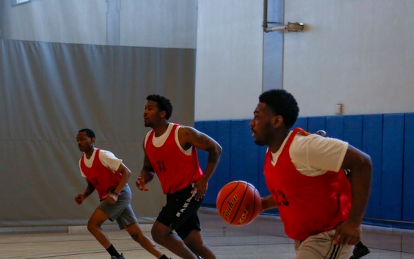 U.S. Navy Sailors from Abraham Lincoln, Michael Monsoor participate in a basketball game during RIMPAC 2022