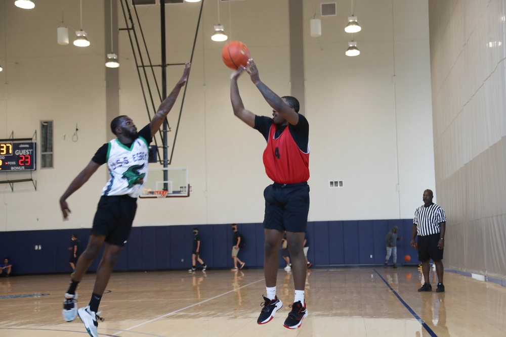 U.S. Navy Sailors from Abraham Lincoln, Essex compete in a basketball game during RIMPAC 2022