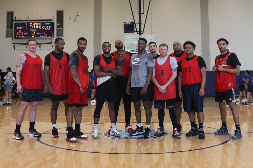 U.S. Navy Sailors from Abraham Lincoln, Essex compete in a basketball game during RIMPAC 2022