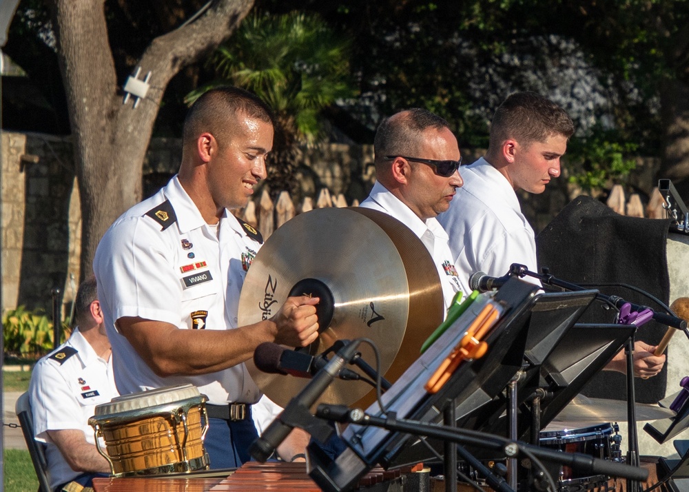 Fort Sam's Own 323d Army Band and the 78th Army Reserve Band perform together at the Alamo