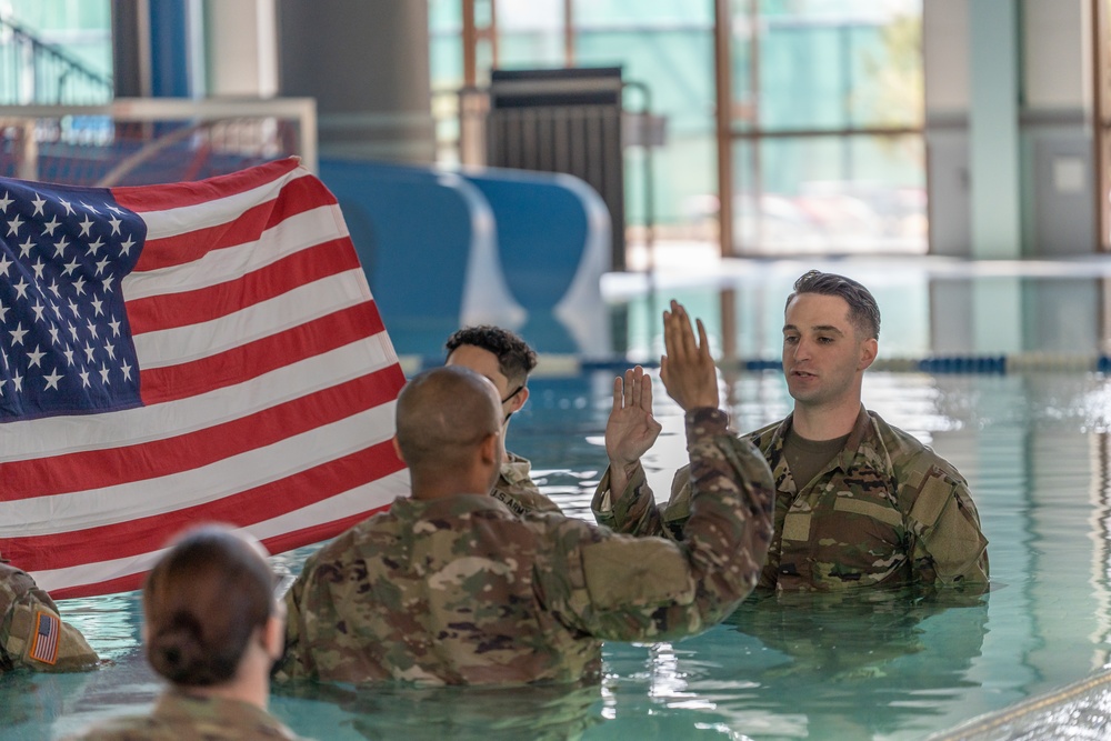 Soldiers conduct water reenlistment ceremony at Camp Walker