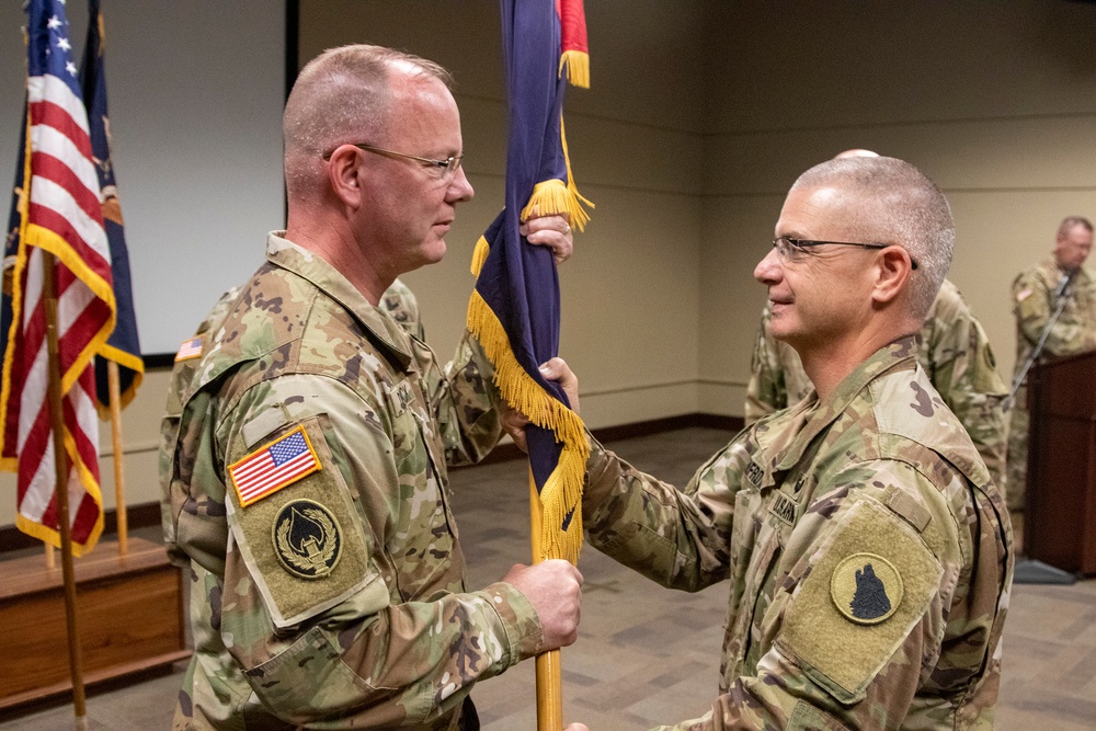 Outgoing commander takes colors one last time