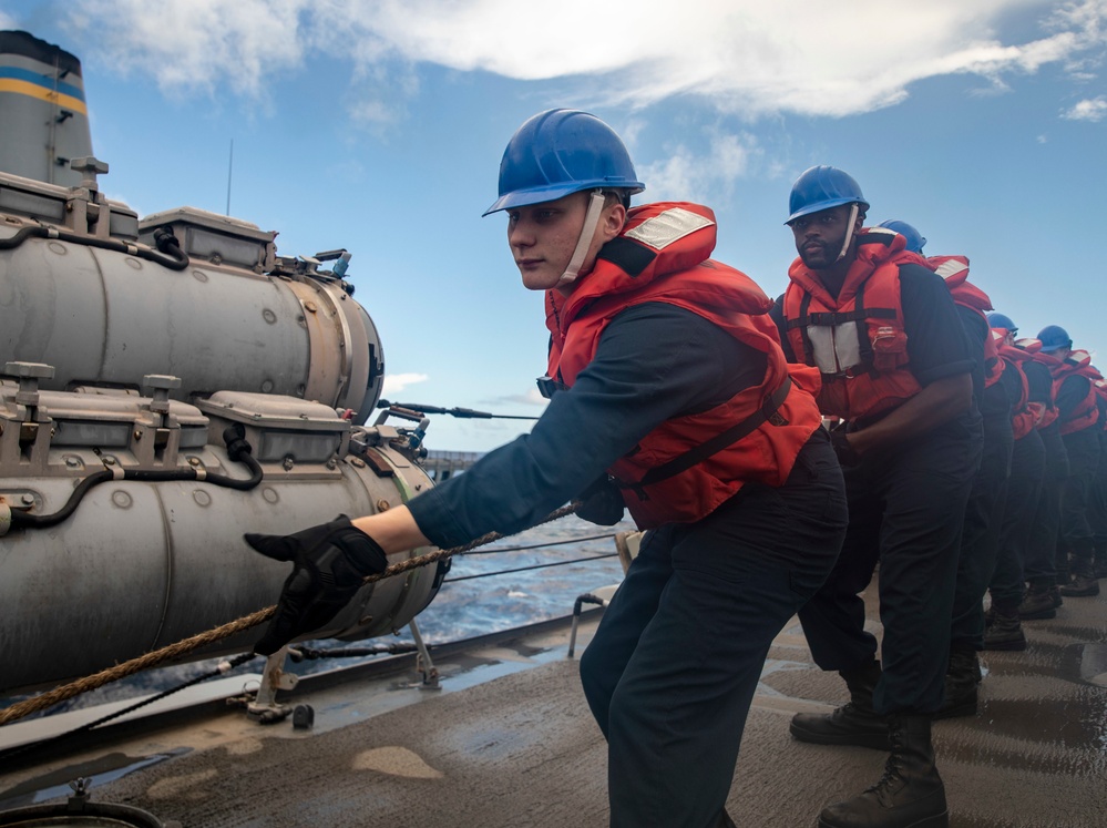 Sailors Aboard USS Dewey (DDG 105) Conduct Replenishment-at-Sea with USNS Tippecanoe (T-AO 199)
