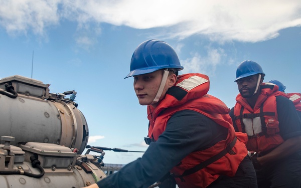 Sailors Aboard USS Dewey (DDG 105) Conduct Replenishment-at-Sea with USNS Tippecanoe (T-AO 199)