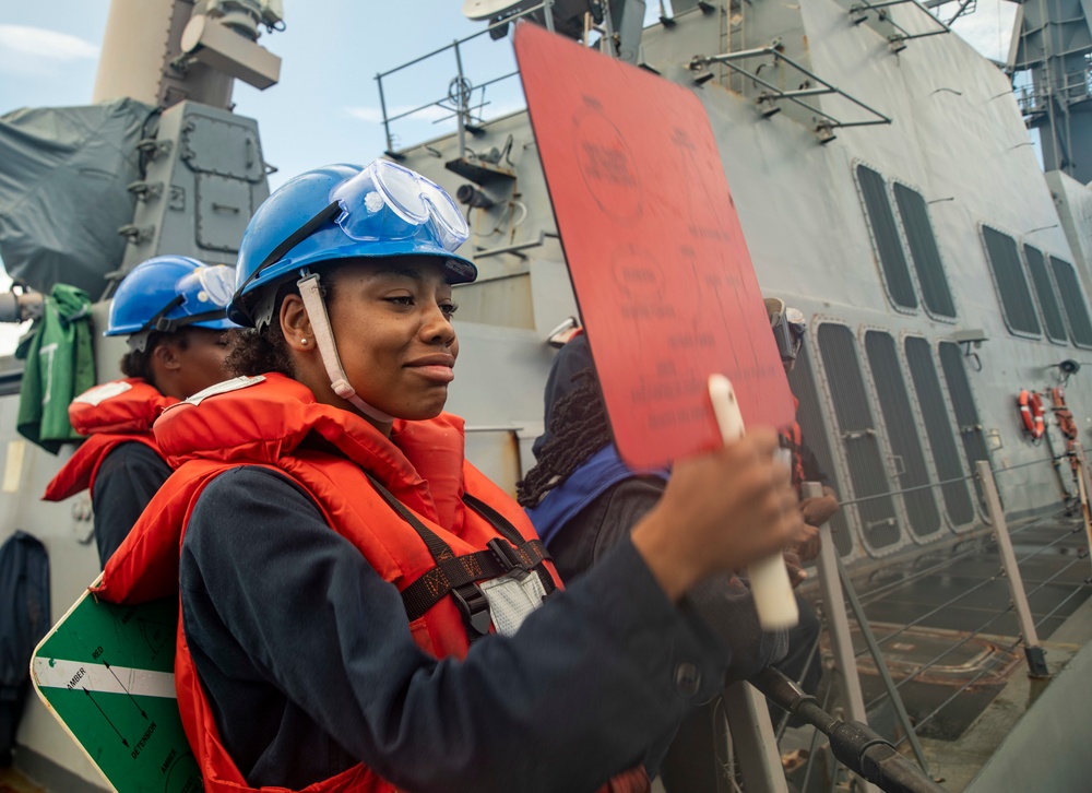 Sailors Aboard USS Dewey (DDG 105) Conduct Replenishment-at-Sea with USNS Tippecanoe (T-AO 199)