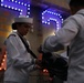 Sailors from Abraham Lincoln lower the national ensign during RIMPAC 2022