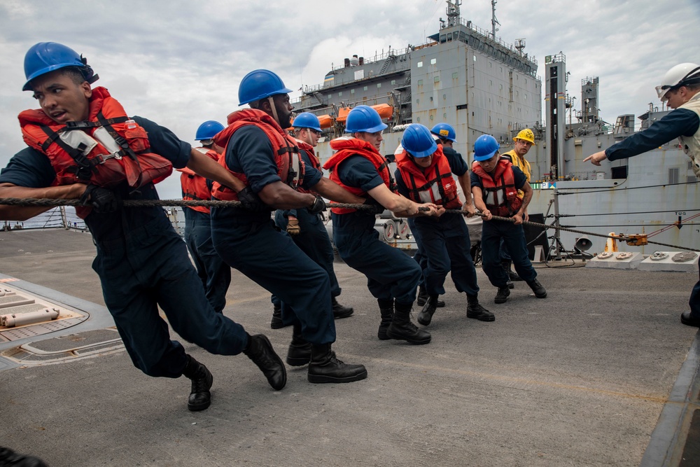 Sailors Aboard USS Dewey (DDG 105) Conduct Replenishment-at-Sea with USNS Cesar Chavez (T-AKE-14)