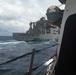 Sailors Aboard USS Dewey (DDG 105) Conduct Replenishment-at-Sea with USNS Cesar Chavez (T-AKE-14)