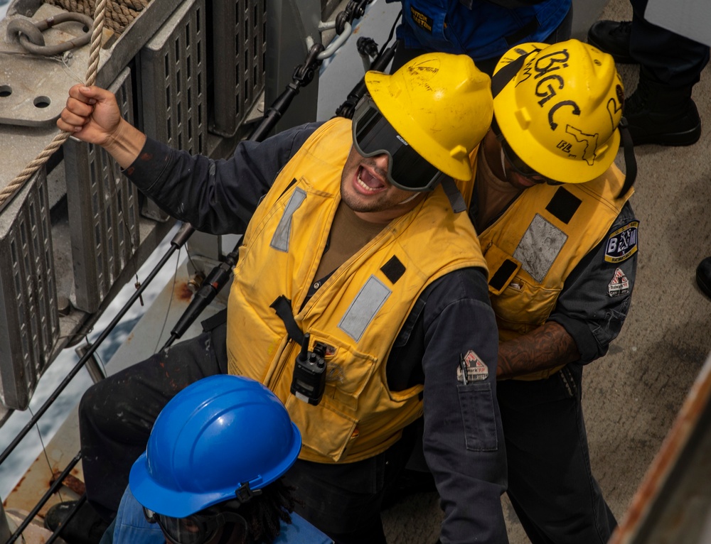 Sailors Aboard USS Dewey (DDG 105) Conduct Replenishment-at-Sea with USNS Cesar Chavez (T-AKE-14)