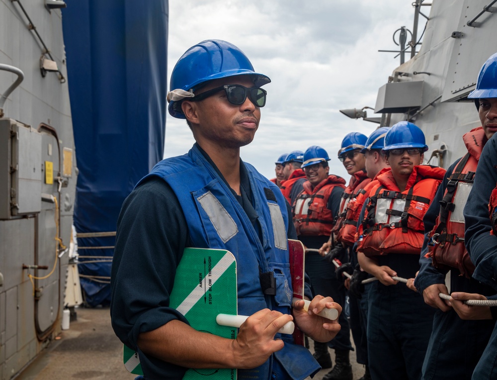 Sailors Aboard USS Dewey (DDG 105) Conduct Replenishment-at-Sea with USNS Cesar Chavez (T-AKE-14)