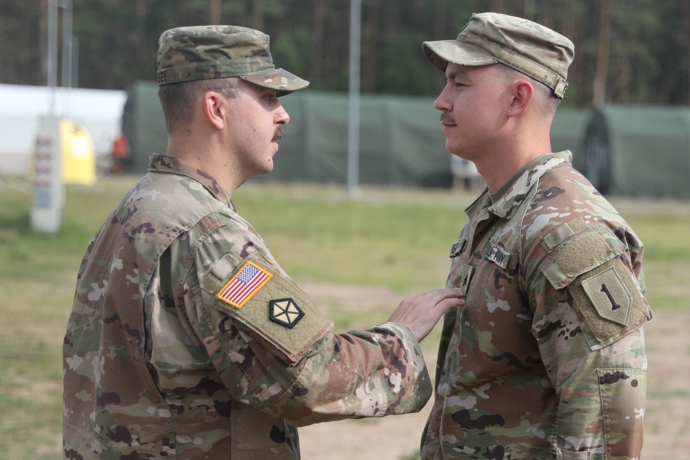 1st Infantry Division Artillery Soldier promotes to the rank of sergeant