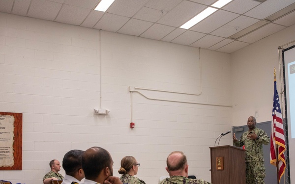 Captain Sanders Speaks at a DCO Symposium