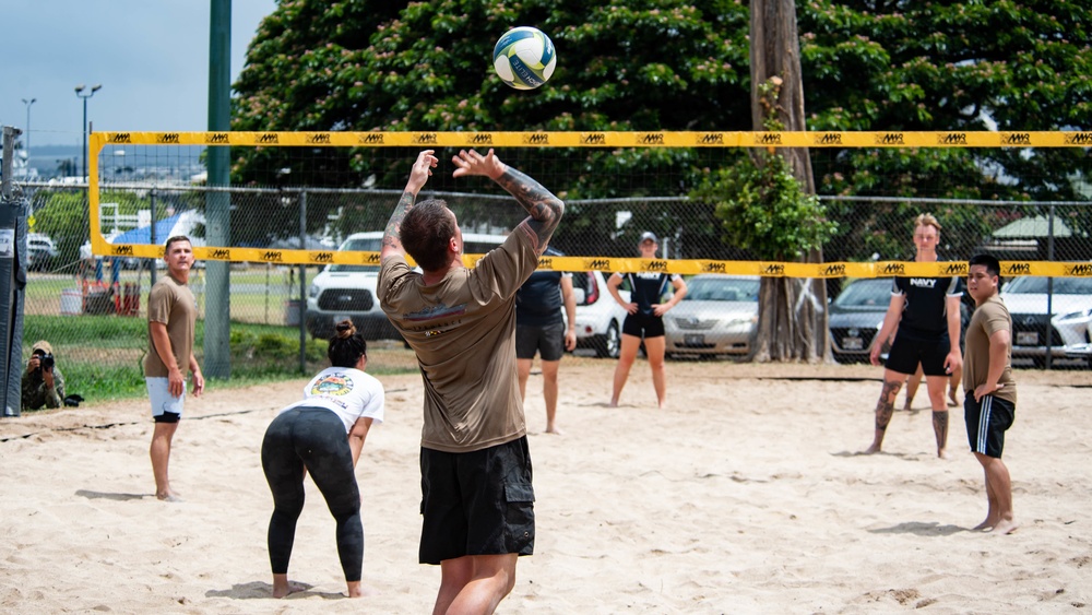 U.S. Navy Sailors and Royal New Zealand Sailors play a game of sand volleyball during RIMPAC 2022