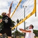 A Royal Australian Navy Sailors play a game of sand volleyball during RIMPAC 2022