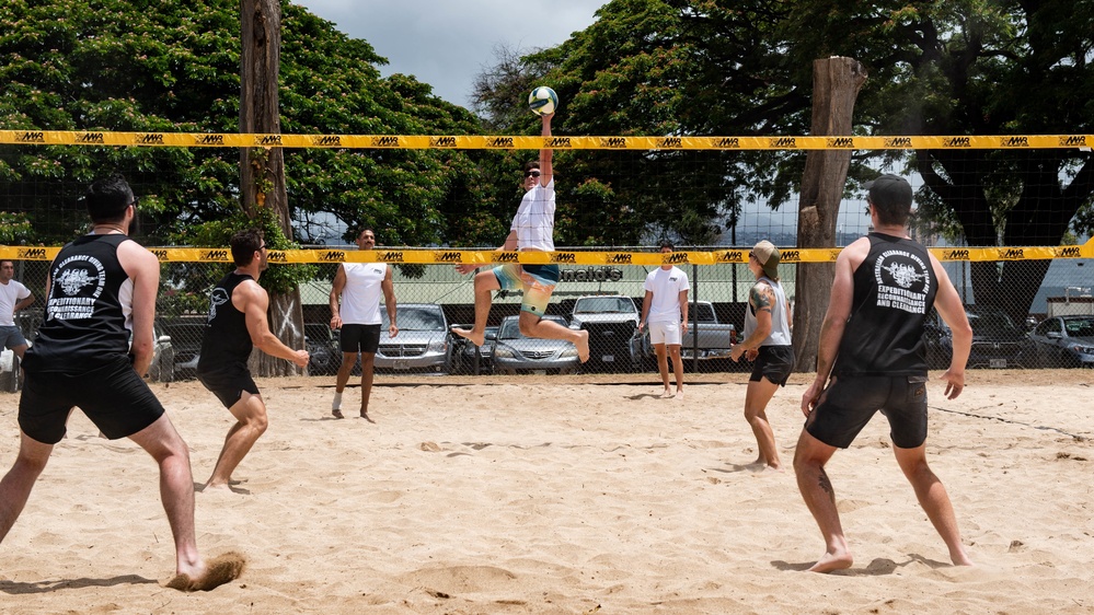 Royal Australian Navy Sailors play a game of sand volleyball during RIMPAC 2022
