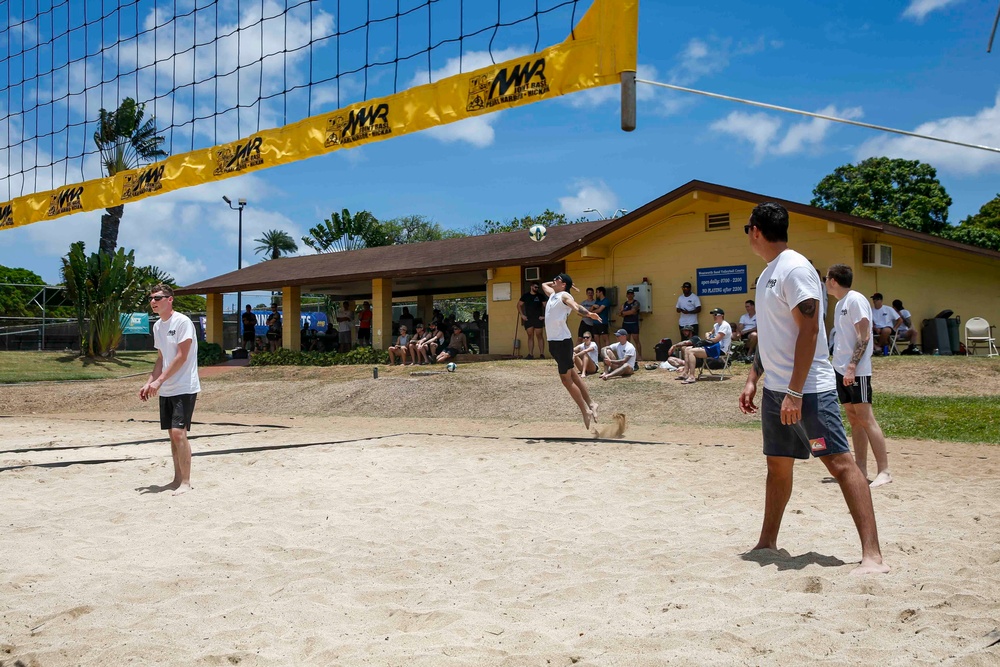 U.S. Navy Sailors from Abraham Lincoln, William P. Lawrence compete in a volleyball game during RIMPAC 2022
