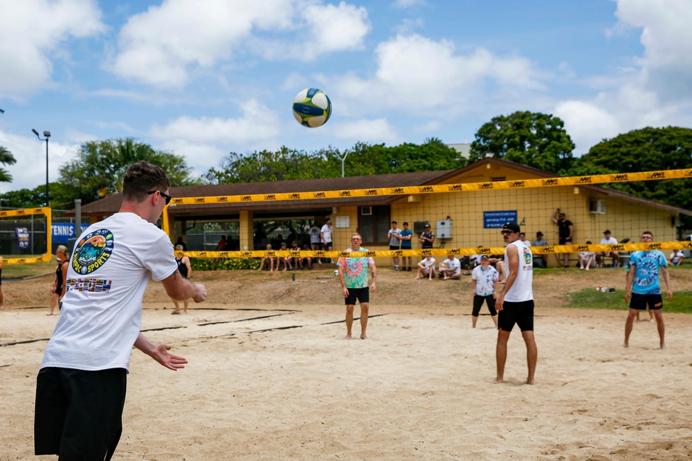 U.S. Navy Sailors from Abraham Lincoln, William P. Lawrence compete in a volleyball game during RIMPAC 2022