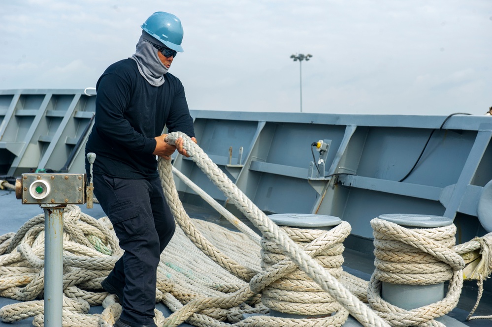 USS Frank Cable Departs Singapore