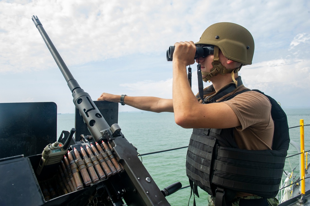 USS Frank Cable Departs Singapore