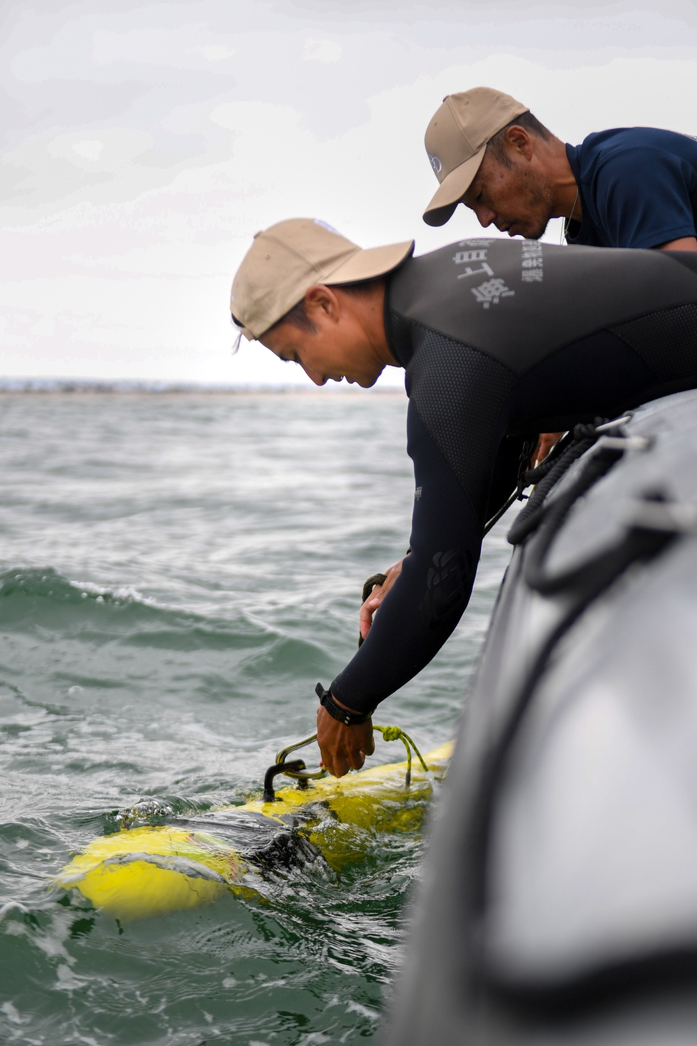 Japan Maritime Self-Defense Force Sailors Conduct AUV Calibration