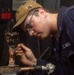 USS Ronald Reagan (CVN 76) Sailors braze pipes in the machine shop