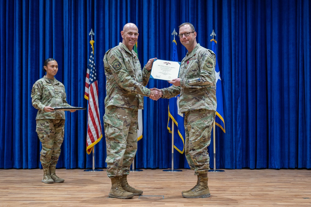 386th AEW change of command: Col. George M. Buch Jr. succeeds Col. Clinton M. Wilson