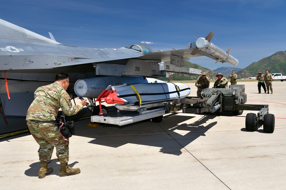 Airmen from AATC load JASSM on pre-block F-16