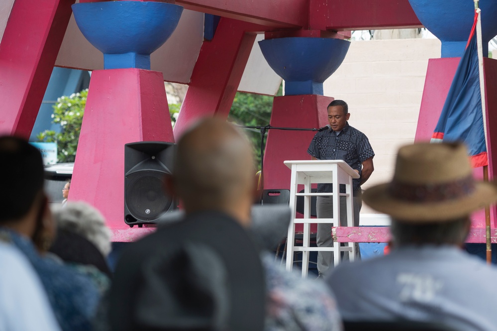The village of Yona pays their respects at the Mañenggon and Asinan Memorials
